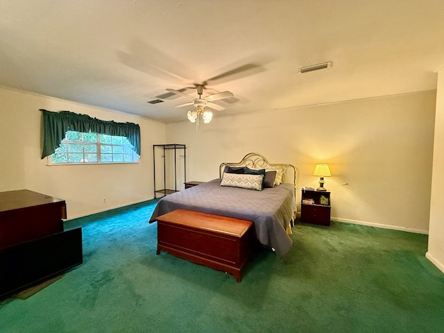 152 W Cox St, Slocomb, AL 36375 - bedroom with carpet flooring, a ceiling fan, and baseboards