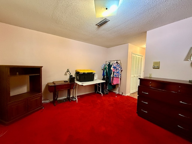 152 W Cox St, Slocomb, AL 36375 - misc room with carpet, a textured ceiling, and baseboards