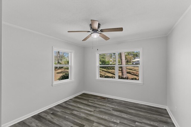 unfurnished dining area featuring dark hardwood / wood-style flooring, ornamental molding, and a chandelier