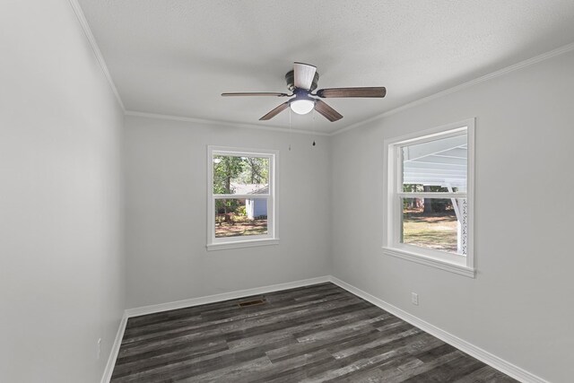 unfurnished dining area with crown molding, dark wood-type flooring, and ceiling fan with notable chandelier