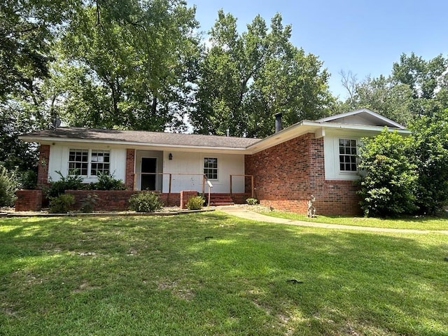 ranch-style house with a front lawn