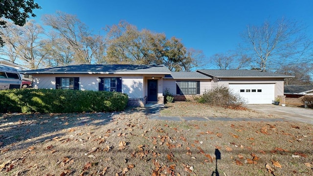 ranch-style house with a garage