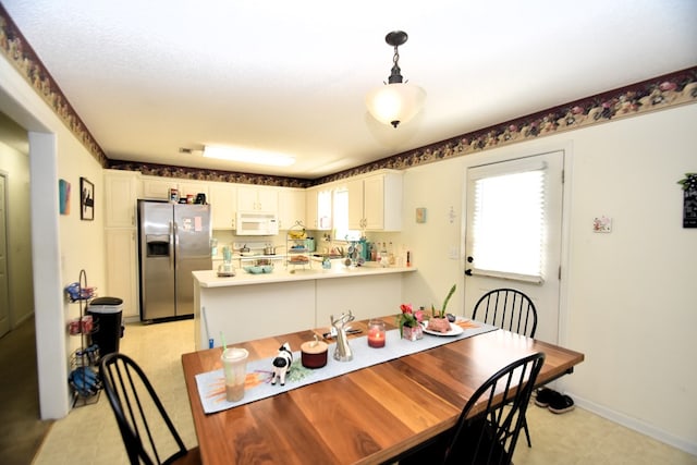 2023 Brackin Dr, Dothan, AL 36301 - dining room featuring light floors and baseboards