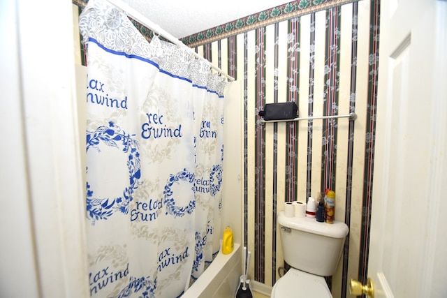2023 Brackin Dr, Dothan, AL 36301 - bathroom featuring toilet, wallpapered walls, and shower / bath combo with shower curtain