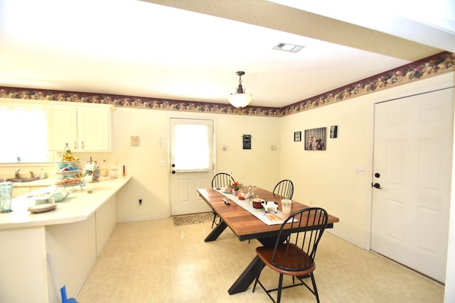 2023 Brackin Dr, Dothan, AL 36301 - dining area with healthy amount of natural light, light flooring, and baseboards
