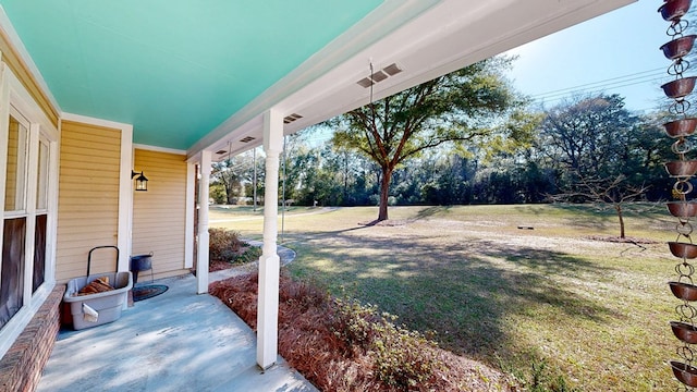 view of yard with a porch