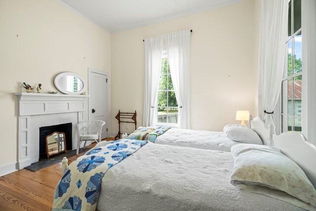 5606 Rocky Creek Rd, Ashford, AL 36312 - bedroom with ornamental molding and wood finished floors