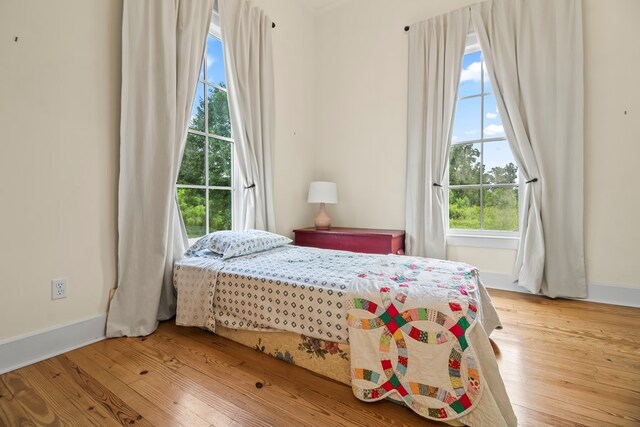 5606 Rocky Creek Rd, Ashford, AL 36312 - bedroom featuring light wood-type flooring and baseboards