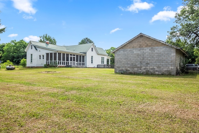 5606 Rocky Creek Rd, Ashford, AL 36312 - back of property featuring a sunroom and a yard