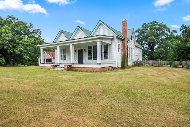 5606 Rocky Creek Rd, Ashford, AL 36312 - view of front facade featuring a chimney and covered porch