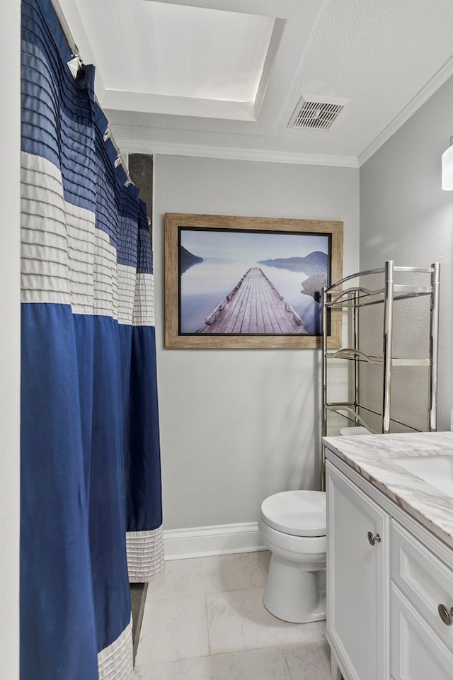 bathroom with vanity, baseboards, visible vents, ornamental molding, and toilet