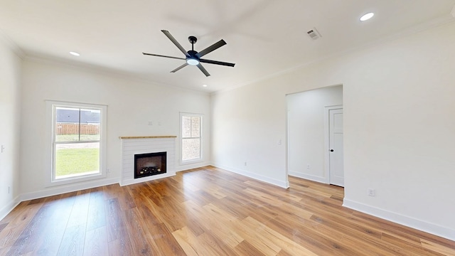 108 Weeping Willow Trl, Headland, AL 36345 - unfurnished living room with crown molding, a ceiling fan, light wood-style flooring, baseboards, and recessed lighting
