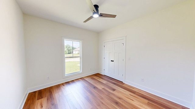 108 Weeping Willow Trl, Headland, AL 36345 - unfurnished room featuring light wood finished floors, ceiling fan, and baseboards