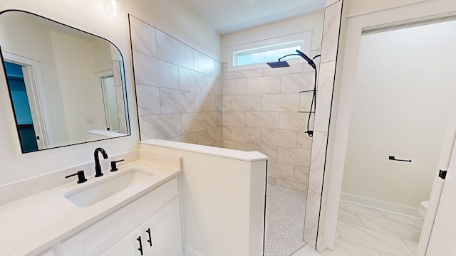 108 Weeping Willow Trl, Headland, AL 36345 - full bathroom with marble finish floors, a walk in shower, vanity, and toilet