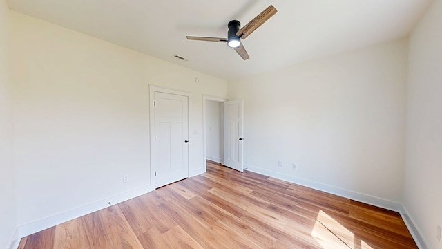 108 Weeping Willow Trl, Headland, AL 36345 - unfurnished bedroom featuring light wood finished floors, baseboards, and ceiling fan