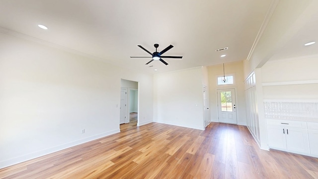 108 Weeping Willow Trl, Headland, AL 36345 - unfurnished living room featuring crown molding, baseboards, light wood-style floors, ceiling fan, and recessed lighting