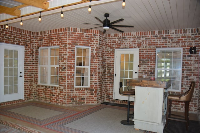 view of patio / terrace featuring outdoor dry bar and a ceiling fan