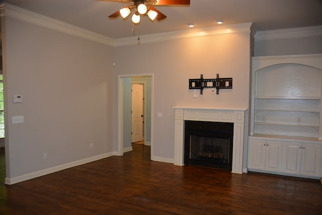 unfurnished living room featuring ornamental molding, dark wood-style flooring, and a ceiling fan