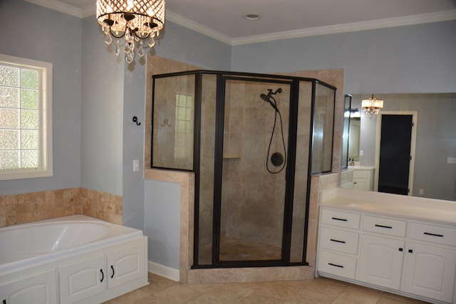 bathroom with a bath, tile patterned floors, a stall shower, an inviting chandelier, and vanity