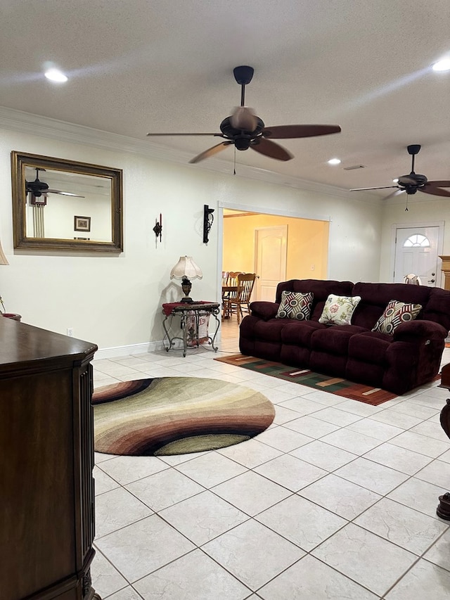 living area featuring crown molding, recessed lighting, ceiling fan, and light tile patterned flooring