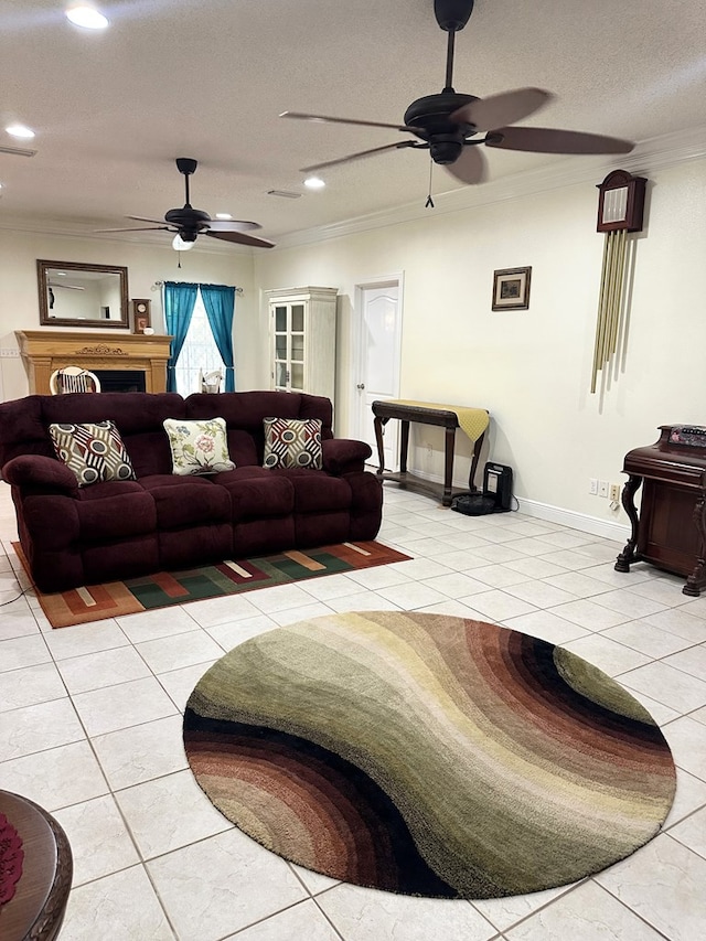 tiled living area featuring crown molding, ceiling fan, a textured ceiling, recessed lighting, and baseboards