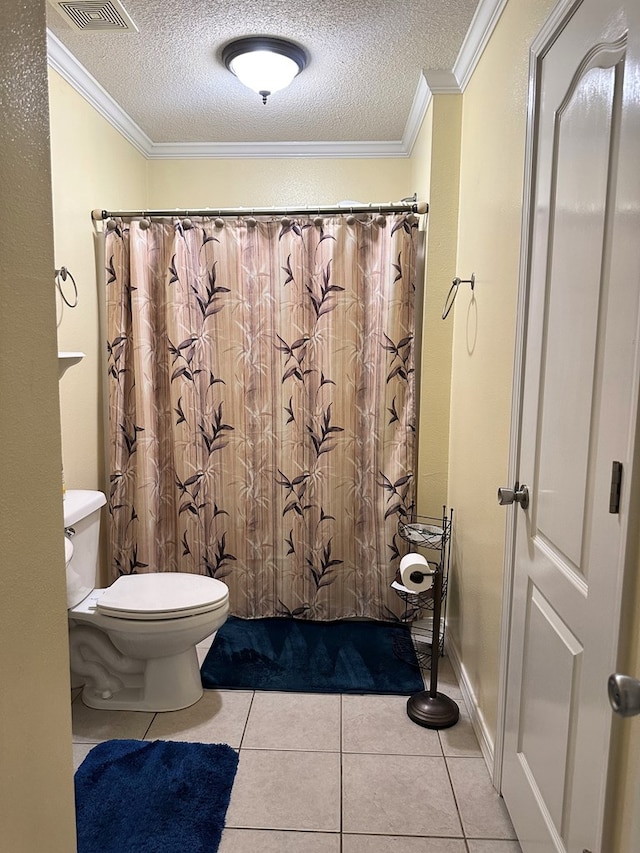 full bath with tile patterned flooring, a textured ceiling, crown molding, and toilet