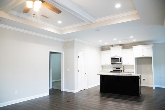 kitchen featuring sink, white cabinetry, a center island with sink, dark hardwood / wood-style flooring, and stainless steel appliances