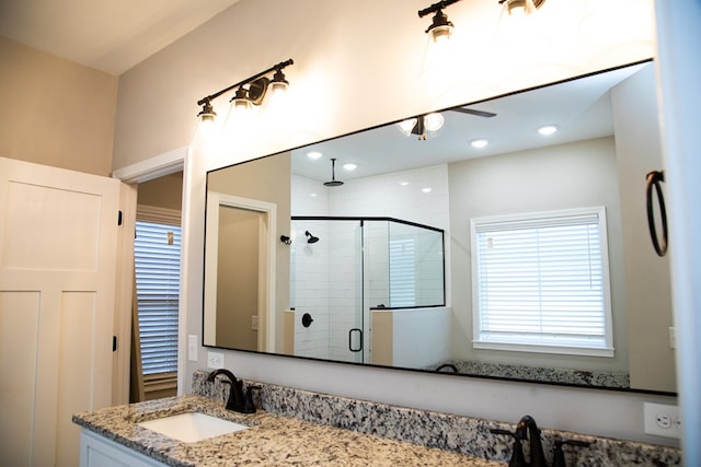 bathroom featuring vanity and walk in shower