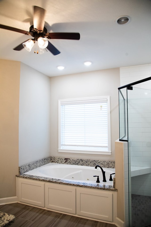 bathroom featuring plus walk in shower