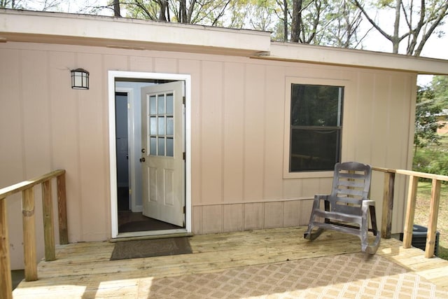 entrance to property featuring a deck