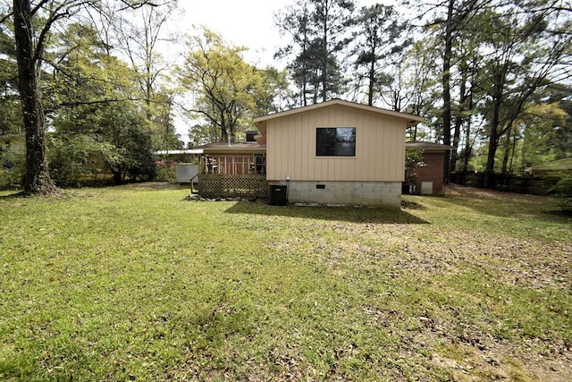 exterior space with a deck and central AC