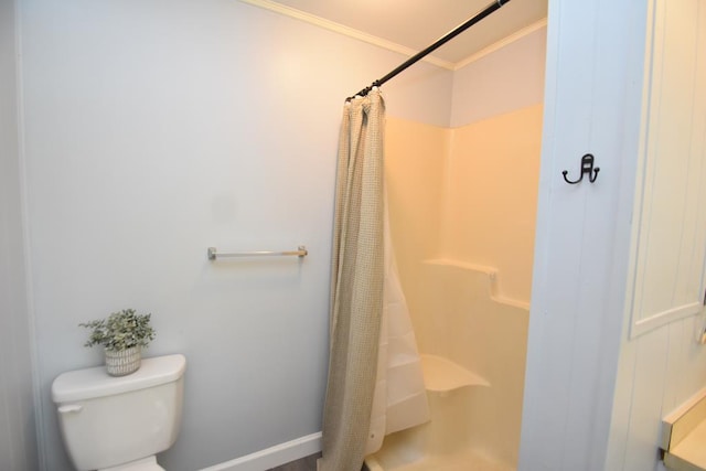 145 Deerpath St, Ozark, AL 36360 - bathroom with toilet, a shower with curtain, and ornamental molding