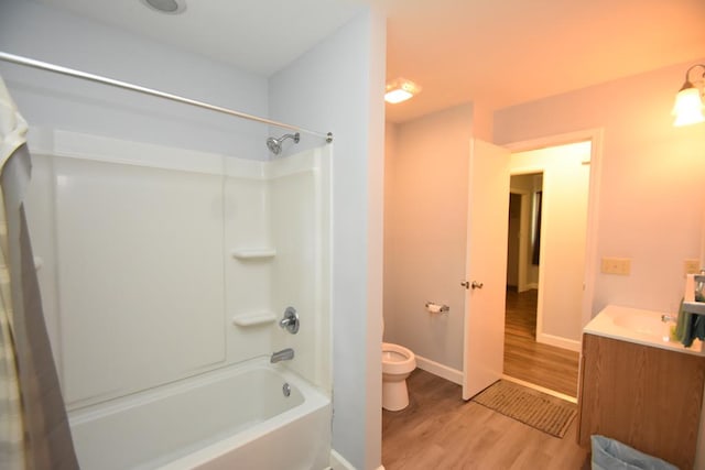 145 Deerpath St, Ozark, AL 36360 - full bathroom featuring toilet, shower / bath combo, wood finished floors, vanity, and baseboards