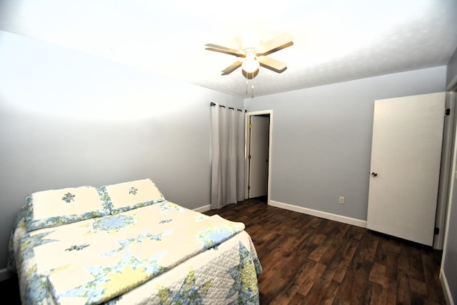 145 Deerpath St, Ozark, AL 36360 - bedroom featuring dark wood-style floors, baseboards, and ceiling fan