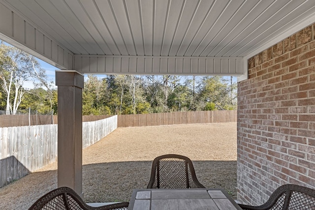 view of patio / terrace featuring a fenced backyard and outdoor dining space