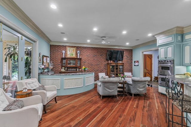 109 Royal Highlands Ln, Dothan, AL 36305 - living area featuring crown molding, dark wood-type flooring, brick wall, ceiling fan, and recessed lighting