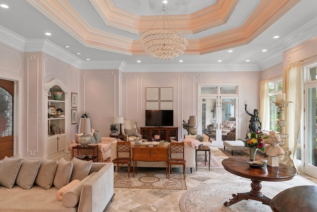 109 Royal Highlands Ln, Dothan, AL 36305 - living area with a chandelier, crown molding, a towering ceiling, a tray ceiling, and recessed lighting