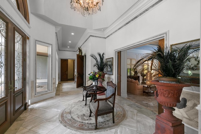 109 Royal Highlands Ln, Dothan, AL 36305 - foyer entrance featuring a high ceiling, crown molding, a chandelier, light marble finish flooring, and plenty of natural light