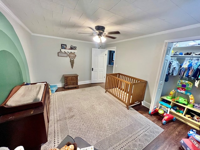 601 6th Ave, Ashford, AL 36312 - bedroom with wood finished floors, ornamental molding, a closet, and ceiling fan