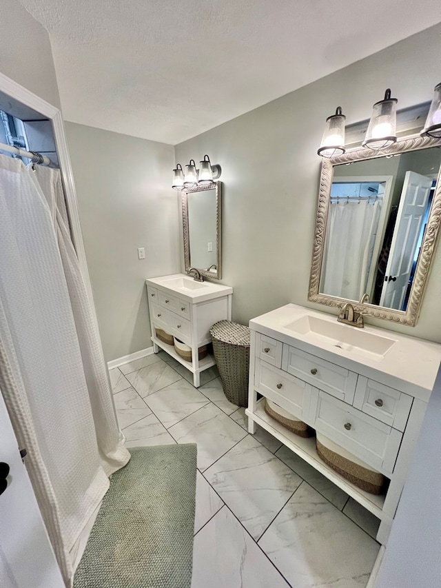 601 6th Ave, Ashford, AL 36312 - bathroom featuring marble look tiles, vanity, curtained shower, and a textured ceiling