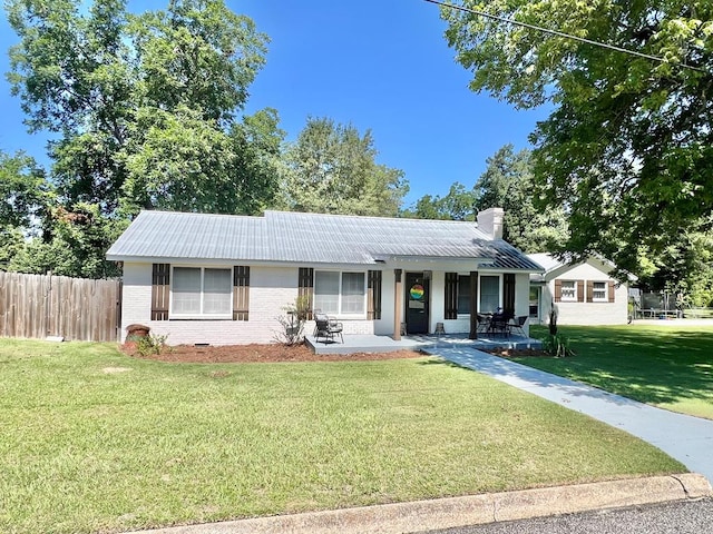 601 6th Ave, Ashford, AL 36312 - ranch-style house with brick siding, covered porch, a chimney, and a metal roof