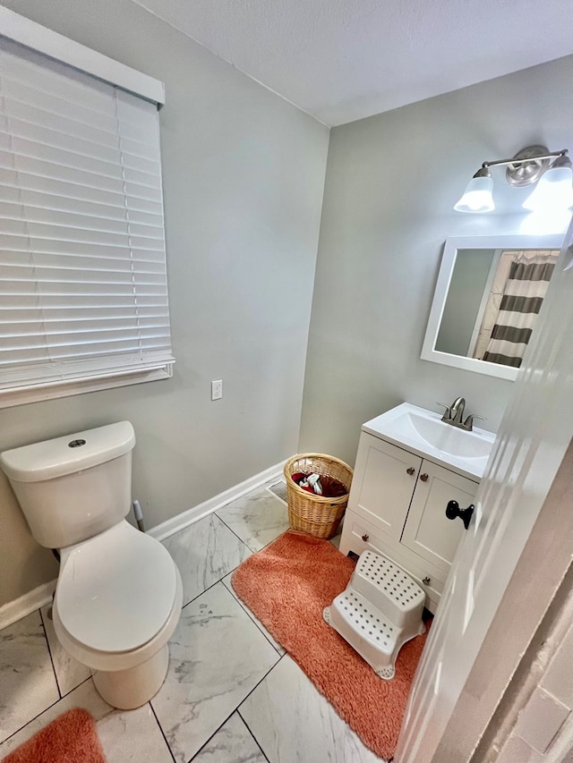 601 6th Ave, Ashford, AL 36312 - bathroom featuring marble finish floors and vanity