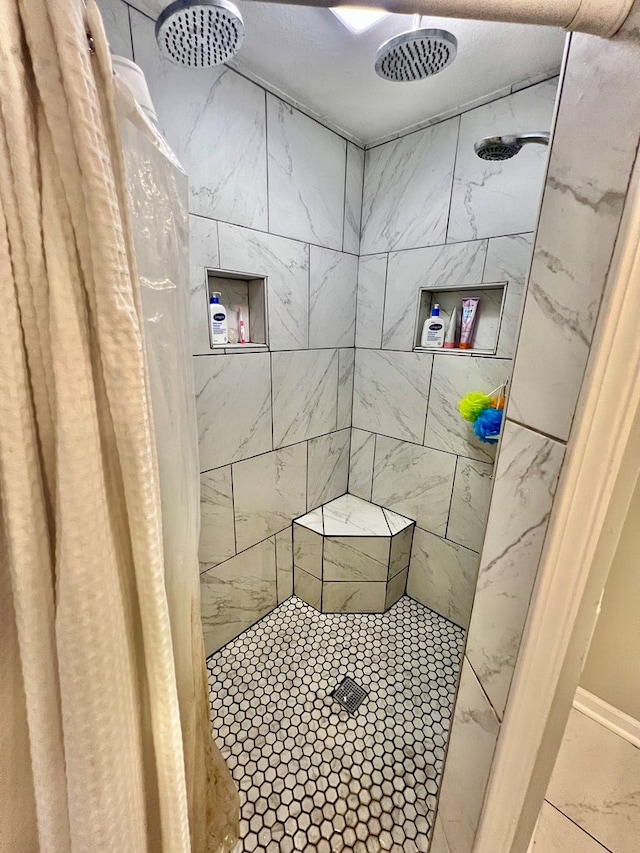 601 6th Ave, Ashford, AL 36312 - full bathroom featuring tiled shower and marble finish floors