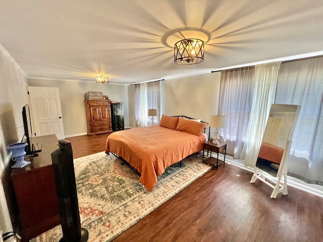 601 6th Ave, Ashford, AL 36312 - bedroom with wood finished floors and crown molding