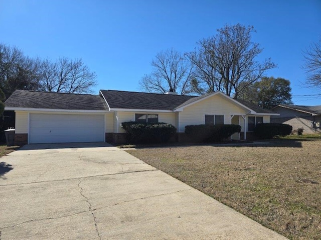 single story home with a front lawn and a garage