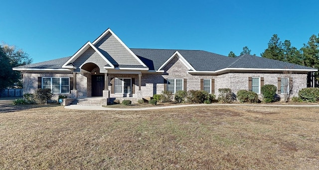 view of front of house with a front lawn