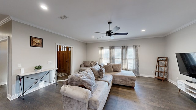 living room featuring ceiling fan, dark hardwood / wood-style floors, and ornamental molding