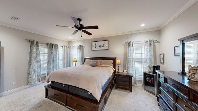 bedroom featuring light carpet, ceiling fan, and ornamental molding