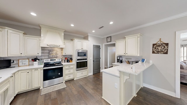 kitchen with dark hardwood / wood-style flooring, backsplash, premium range hood, crown molding, and appliances with stainless steel finishes