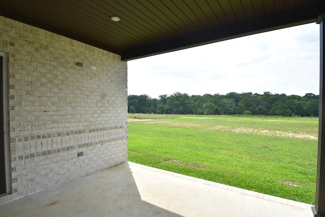 5120 Judge Logue Rd, Newton, AL 36352 - view of green lawn featuring a patio area, a view of rural / pastoral area, and a forest view